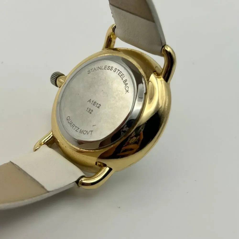 Women’s Gold-tone Crystal Bezel Mother Pearl Dial White Band Minimalist Watch